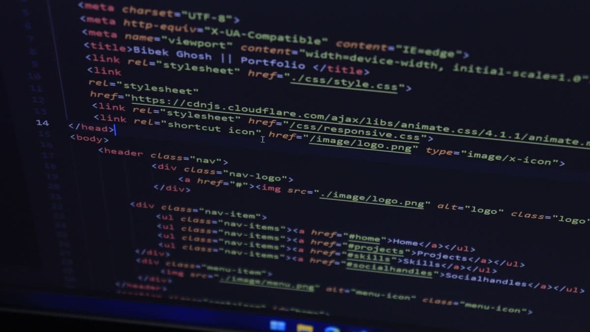 Website code on a dark screen